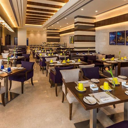 Golden Tulip Media Hotel Dubai Esterno foto