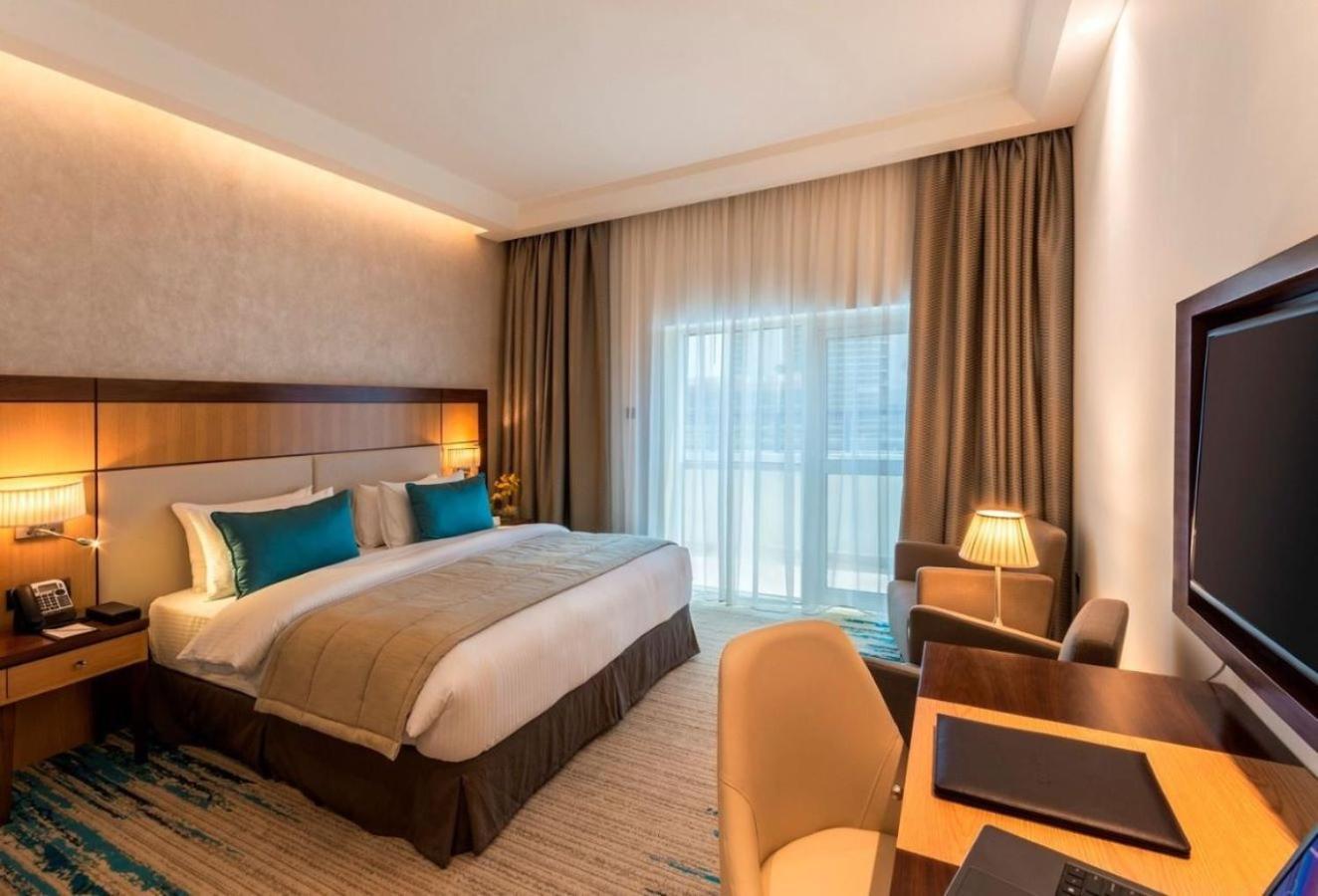 Golden Tulip Media Hotel Dubai Esterno foto