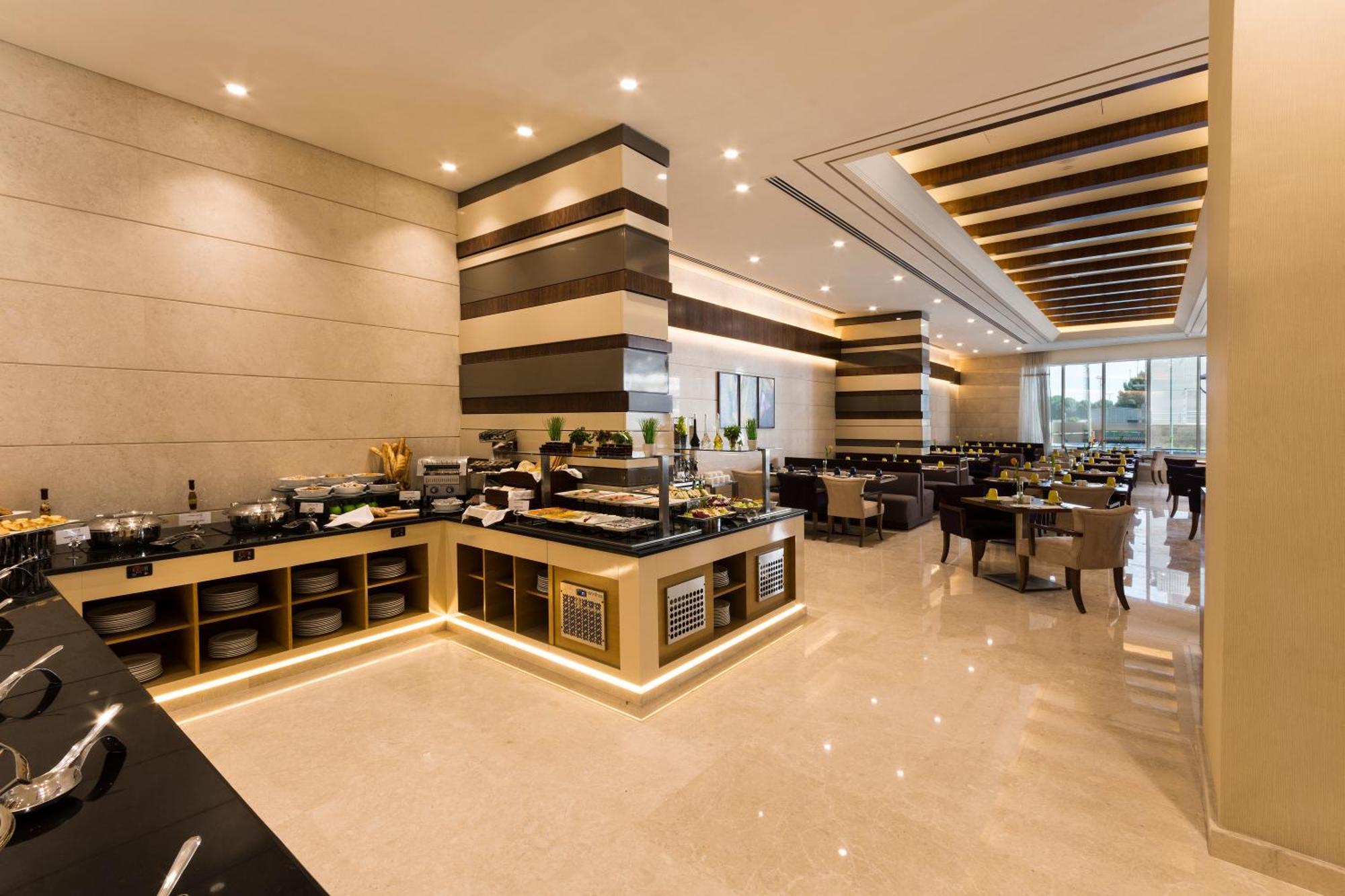 Golden Tulip Media Hotel Dubai Esterno foto