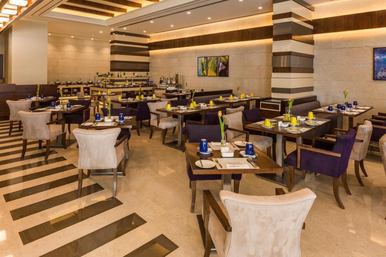 Golden Tulip Media Hotel Dubai Esterno foto