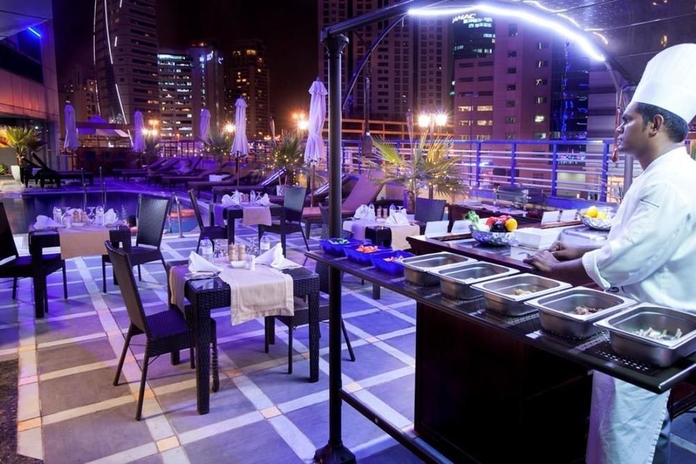 Golden Tulip Media Hotel Dubai Esterno foto